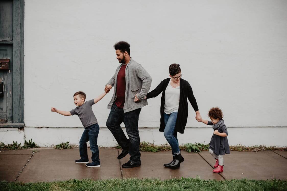 Family walking together after a counselling session for toxic stress