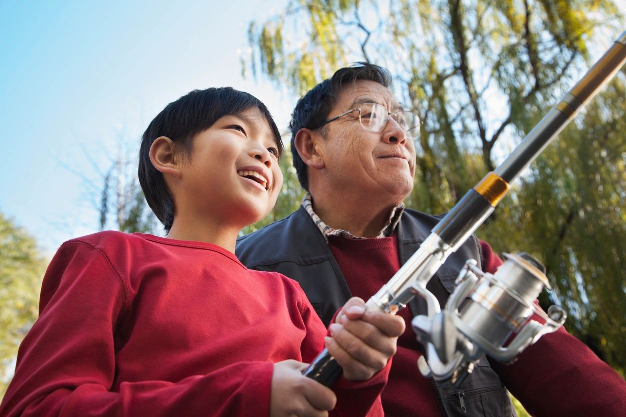 dad fishing with son